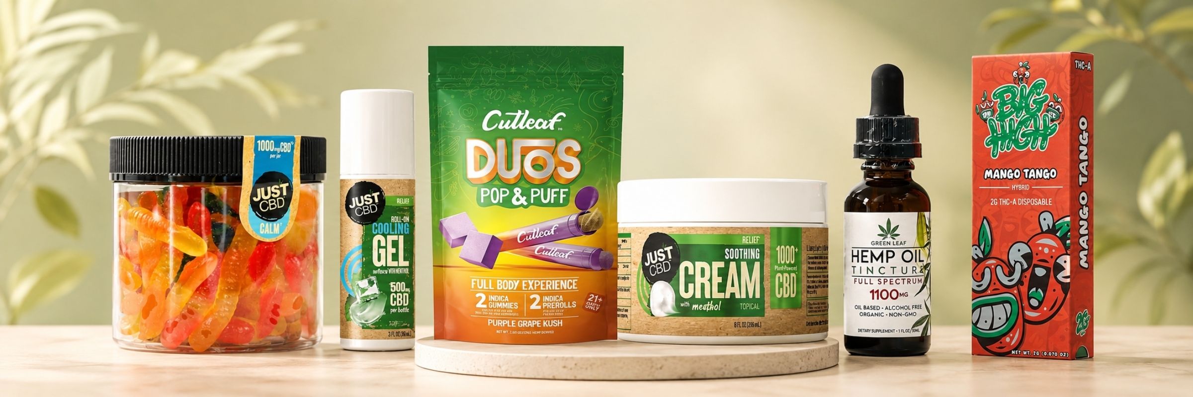 CBD product collection banner featuring gummies, cooling gel, cream, hemp oil tincture, and vape products on a soft green background.